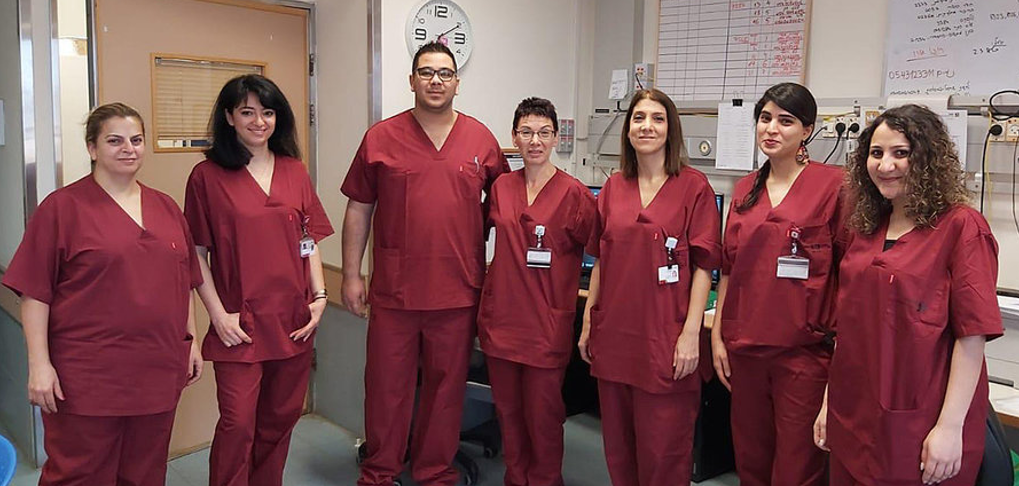 Jewish and Arab members of the coronavirus team at Rambam Hospital in Haifa, Israel. Coutesy of Dr. Yasmin Diab (second from right) Jewish and Arab members of the coronavirus team at Rambam Hospital in Haifa, Israel. Coutesy of Dr. Yasmin Diab (second from right)